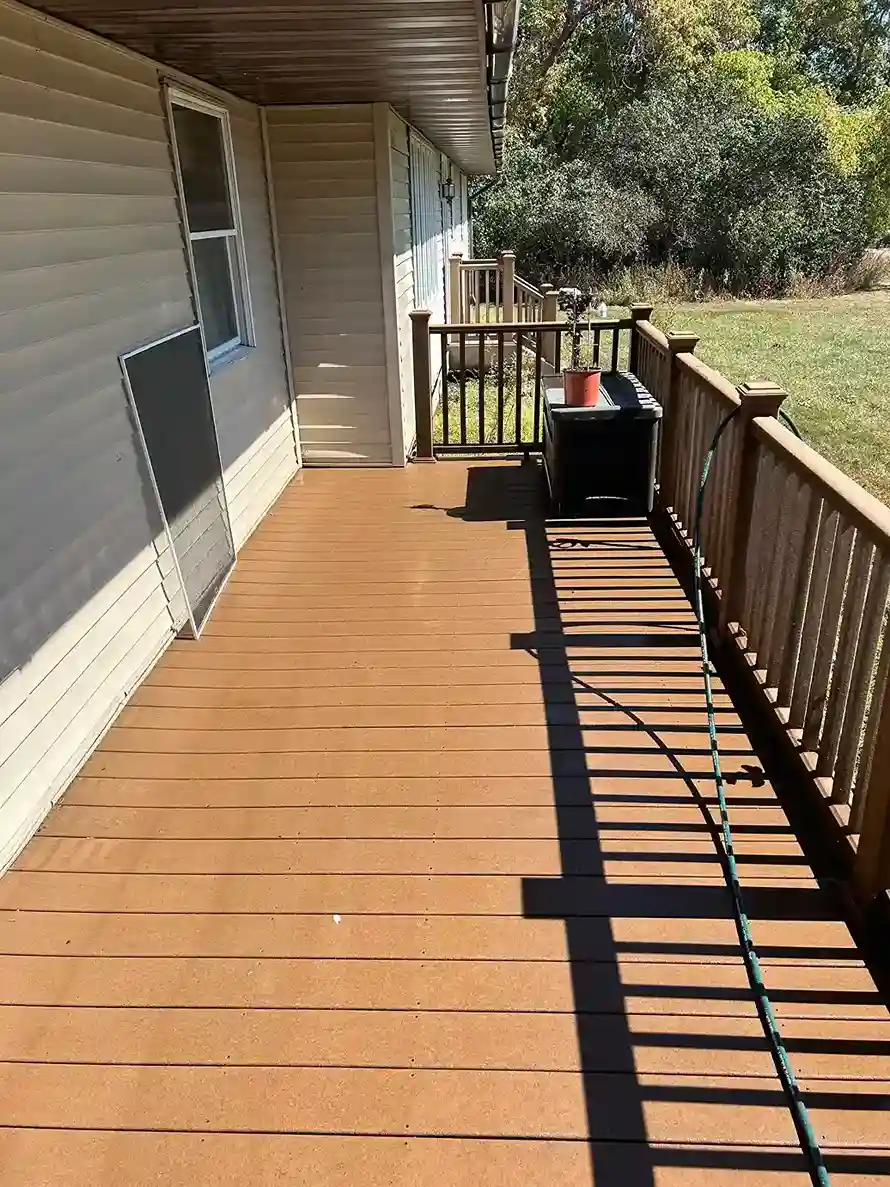 Residential house wash and gutter face brightening in Morris Minnesota
