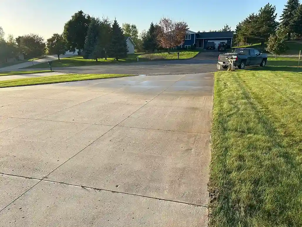 Commercial concrete sidewalk pressure washing for storefront in Morris MN