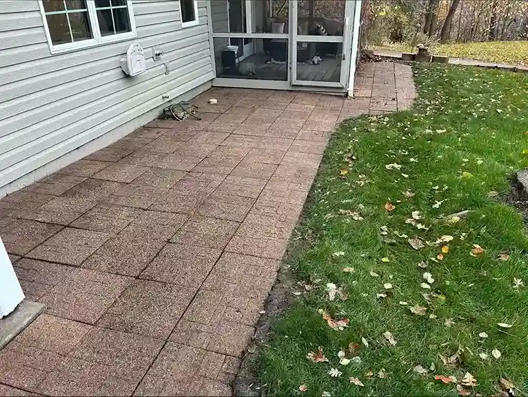 Concrete curb and gutter cleaning removing sediment and organic film