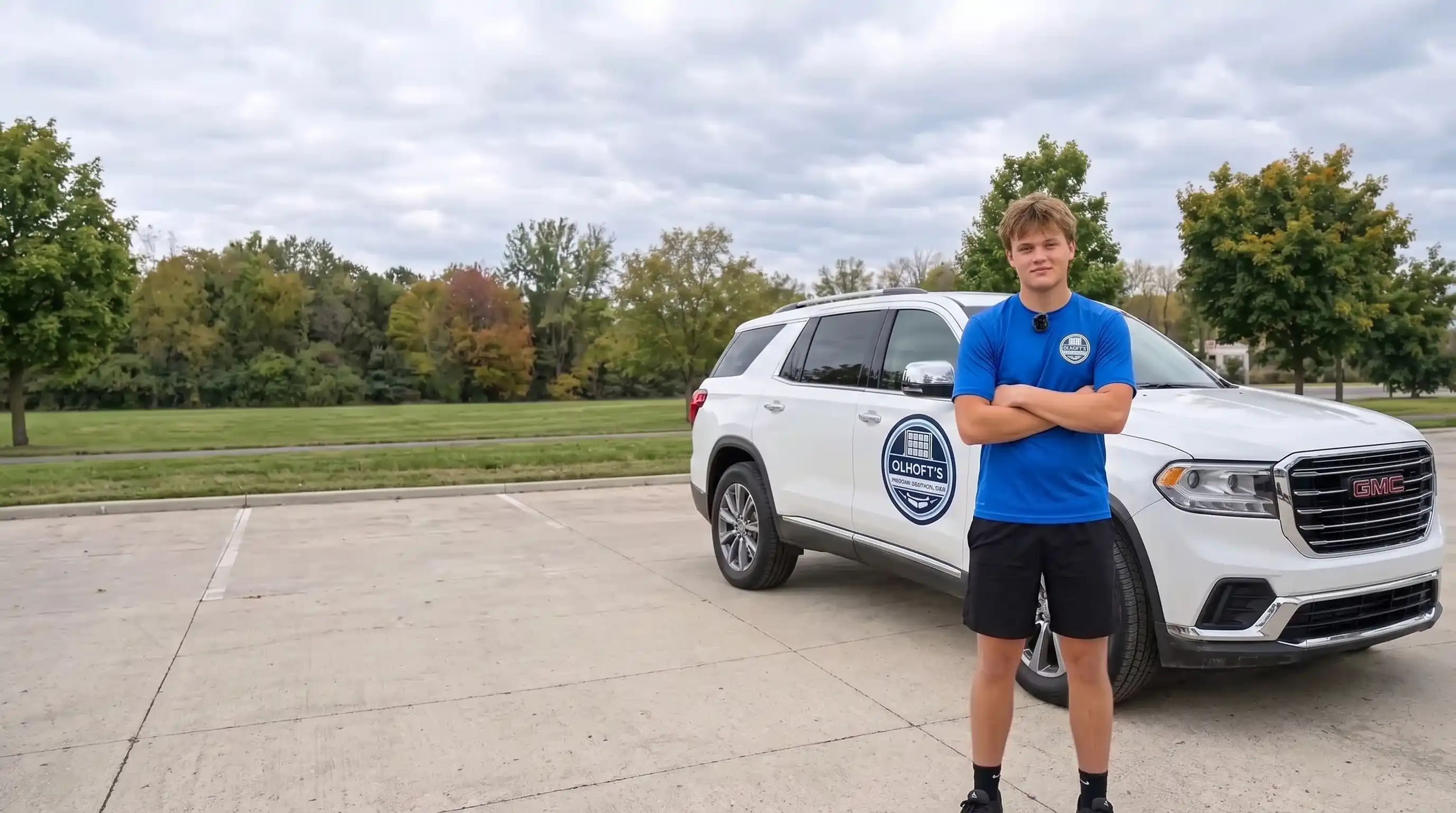 Conner Olhoft with Olhoft's Window & Surface Care exterior cleaning and junk removal service vehicle in Morris, MN